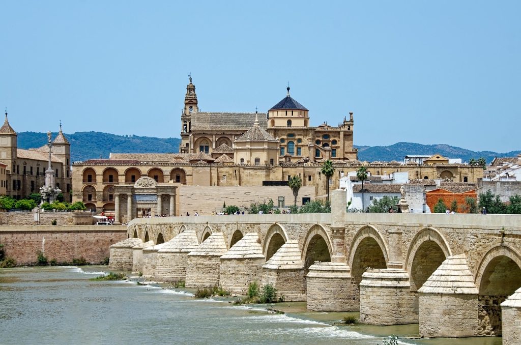 spain, andalusia, province of cordoba, cordoba, province, city, historic centre, historic center, mezquita-catedral de cordoba, cordoba cathedral mosque, cathedral, mosque, religion, puente romano, puente viejo, bridge roman, historical, nature, guadalquivir, flow, water, heaven, blue, to travel, tourism, sightseeing